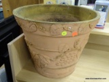 (R4) LARGE RESIN PLANTER; TERRACOTTA STYLE PLANTER WITH LEAVES AND GRAPE CLUSTERS ON THE OUTSIDE.