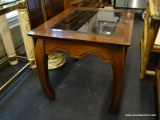 (WINDOW) GLASS TOP END TABLE; BEVELED GLASS END TABLE WITH A CARVED OUTLINE RELIEF AROUND THE TABLE