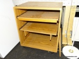(BWALL) ROLL-OUT SHELVING UNIT; THREE TIERED WOOD GRAIN SHELVING CABINET WITH TWO ROLL-OUT SHELVES.