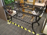 (R5) ASHLEY FURNITURE PATIO TABLE; HAS A BLACK METAL FRAME AND APPEARS TO HAVE HAD A GLASS MOSAIC