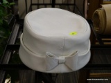 (R5) ELLEN JANE WOMAN'S HAT; WHITE LEATHER ROUND HAT WITH A BOW ON ONE SIDE. MEASURES 4 IN TALL WITH