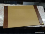 (R1) BOMBAY DESK BLOTTER; HAS A BROWN LEATHER PAD WITH WOOD PANELED SIDES AND A FELT BOTTOM.