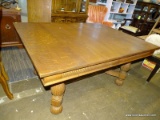 (R1) OAK DINING TABLE; TABLE COMES WITH A REED DETAILED SKIRT AND 4 VASE SHAPED, SHELL DETAILED LEGS