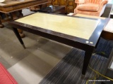(R1) COFFEE TABLE; WOODEN COFFEE TABLE WITH WOOD GRAIN SURFACE, HAS TAPERED BLOCK LEGS AND METAL