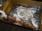 (R7) BOX LOT OF ASSORTED PLUMBING SUPPLIES; BOX LOT TO INCLUDE 1.5 IN PIPE HANGER DWV'S, STRONG ARM