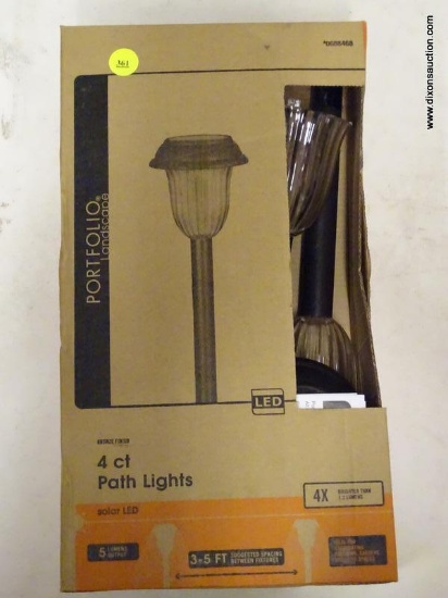 (R6) PORTFOLIO PATH LIGHTS; 4 PACK OF SOLAR LED PATH LIGHTS. PRODUCT NO 0688468. MISSING 3 OUT OF 4