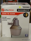 (R6) UTILITECH AREA LIGHT; 1-HEAD GRAY METAL HALIDE DUSK-TO-DAWN FLOOD LIGHT. PRODUCT NO. 053682