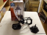 (R6) SECURE HOME OUTDOOR WALL LANTERN; SECURE HOME 14.375-IN H BLACK MEDIUM BASE OUTDOOR WALL LIGHT.