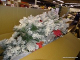 (R8) PULEO INTERNATIONAL ARTIFICIAL CHRISTMAS TREE. HAS A FAUX SNOW COVERING THE BRANCHES AND HAS