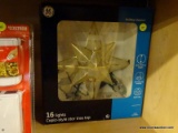 (R9) GE HOLIDAY CLASSICS CAPIZ-STYLE STAR TREE TOP WITH 16 LIGHTS AND A MOUNTING CLIP. MEASURES 10