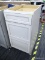 (R9) FILE CABINET; COMPOSITE FILE CABINET, WHITE IN COLOR. HAS THREE STACKED PULL-OUT DRAWERS, WITH
