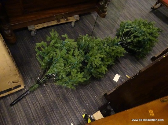 (R1) MATCHING TOP AND BOTTOM SECTION TO AN ARTIFICIAL CHRISTMAS TREE.