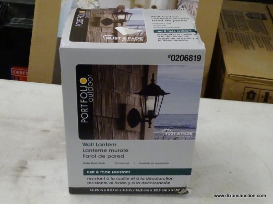 (R3) PORTFOLIO OUTDOOR WALL LANTERN WITH A MATTE BLACK FINISH AND RUST & FADE RESISTANT. COMES IN