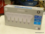 (R3) BOX OF 4 GE, INDOOR FLOODLIGHT 65W DAYLIGHTS. COMES IN OPENED BOX.