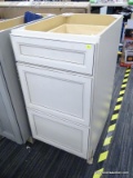 (R9) FILE CABINET; COMPOSITE FILE CABINET, WHITE IN COLOR. HAS THREE STACKED PULL-OUT DRAWERS, WITH