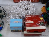 (R12) CHRISTMAS LIGHTS AND LIGHT SHOW WIFI HUB; TWO HOLIDAY LIVING 100 COUNT PACKS OF CORDED CLEAR