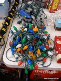 (R12) THREE STRIPS OF CHRISTMAS LIGHTS; TWO SPOOLS OF GENERAL ELECTRIC 75 LED C-9 CHRISTMAS STRING