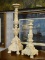 PAIR OF CANDLEHOLDERS; TWO CERAMIC CANDLEHOLDERS, PAINTED WHITE. SITS ON 4 CLAW FEET WITH ASSORTED