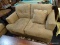 ASHLEY FURNITURE MICROFIBER LOVESEAT; ZIA-MOCHA LOVESEAT WITH A LIGHT BROWN COLOR AND TUFTED