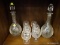 LOT TO INCLUDE 2 ETCHED LIQUID DECANTERS AND 6 ETCHED BRANDY GLASSES.