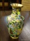 9.5 IN TALL CLOISONNE VASE. HAS 2 DENTS.