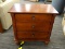 KINCAID NIGHTSTAND; 3-DRAWER, WOODEN NIGHTSTAND WITH REEDED PILASTER SIDES, ACORN SHAPED FEET, AND