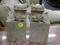 PAIR OF SOAPSTONE, FOO DOG BOOKENDS. MEASURES 7 IN TALL ON A 3 IN SQUARE BASE.