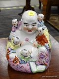 HAND PAINTED LAUGHING BUDDHA WITH CHILDREN CLIMBING ON HIM.