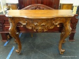 (WINDOW) BOW FRONT HALL TABLE; DARK FINISHED BOW FRONT WOODEN HALL TABLE WITH SCROLL AND LEAF