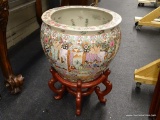 ORIENTAL RED MEDALLION FISH BOWL ON STAND. MEASURES 12 IN TALL WITH A 14.5 IN DIAMETER.