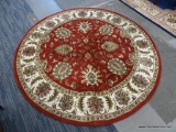 ST CROIX TRADING ROUND AREA RUG; AGRA GOLD, WOOL, ROUND AREA RUG WITH A SAFFRON COLOR AND FLORAL