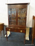 EXQUISITE FLAME MAHOGANY PULL OUT DRAWER WRITING DESK WITH A 24 PANE BOOKCASE TOP. VERY RARE. FROM