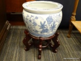 ORIENTAL BLUE AND WHITE FISH BOWL ON STAND. MEASURES 7 IN TALL.