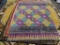 NEW YORK SCHENILLE AREA RUG; MACHINE WOVEN AREA RUG WITH A GEOMETRIC FLORAL PATTERN AND YELLOW,