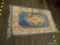 PASTEL SMALL AREA RUG; MACHINE WOVEN, WOOL PILE AREA RUG WITH A PINK, BEIGE, AND BLUE COLOR. HAS