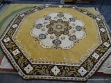 OCTAGONAL AREA RUG; BROWN, BEIGE AND YELLOW COLORED 8-SIDED AREA RUG WITH A FLORAL PATTERN AND