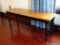 (UPSIT) CONTEMPORARY TWO TONED WOODEN BENCH; RECTANGULAR WOODEN TOP ON BLACK TURNED LEG BASE.