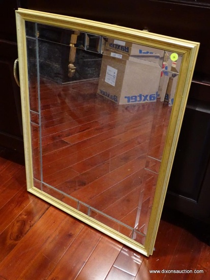 (LIBRARY) GOLD TONE FRAMED WALL MIRROR; BEVELED SECTIONS ALONG THE INSIDE OF THE FRAME. MEASURES