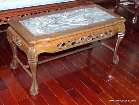 (LR) HEAVILY CARVED ORIENTAL COFFEE TABLE; BLACK & WHITE MARBLE TOP, CARVED SIDES, DRAGON BALL &