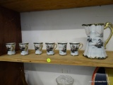 (GAR) UNMARKED NIPPON 7 PC. HAND PAINTED TEA SET; DEPICTS JAPANESE LANDSCAPE. INCLUDES 6 TEA CUPS &