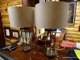 (BDEN) PAIR OF DESIGNER METAL TABLE LAMPS; OPEN WOVEN WIRE DESIGN. EACH COMES WITH LINEN DRUM