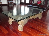 (LR) CARVED WOOD AND GLASS TOP COFFEE TABLE; 1 IN THICK RECTANGULAR GLASS TOP SITTING ON AN