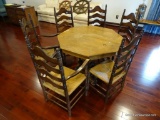 (UPSIT) OCTAGONAL OAK DINING TABLE AND CHAIRS; TABLE SITS ON A REMOVABLE PEDESTAL BASE WITH