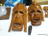 (GAR) PAIR OF TRIBAL MASKS; THESE BEAUTIFULLY CARVED TRIBAL MASKS ARE MEANT TO HAND ON A WALL.