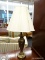 (R2) METAL URN SHAPED HAMMERED STYLE TABLE LAMP; COMES WITH SCALLOPED RIM COOLIE SHADE. MEASURES 34