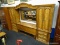 (BWALL) QUEEN/FULL SIZE WALL UNIT HEADBOARD; 4 PC. WALL UNIT HEADBOARD. HAS A CENTER LIFT UP STORAGE