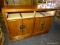 (R3) OFFICE CABINET; WOODEN OFFICE CABINET WITH TWO SPACES AND TRACKS FOR DRAWERS ATOP TWO PAIRS OF