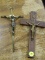 (R3) PAIR OF CRUCIFIXES; TWO CRUCIFIXES, ONE IS A POLISHED BRASS CROSS AND A BRONZE JESUS FIGURINE