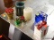 (R4) LOT OF ASSORTED CANDLES; 7 PIECE LOT TO INCLUDE 2 PRESENT SHAPED CANDLES (ONE WITH A CINNAMON