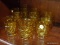 (WALL) LOT OF AMBER GLASSES; 7 PIECE LOT OF AMBER COLORED ROCKS GLASSES TO INCLUDE 4 SHORT GLASSES